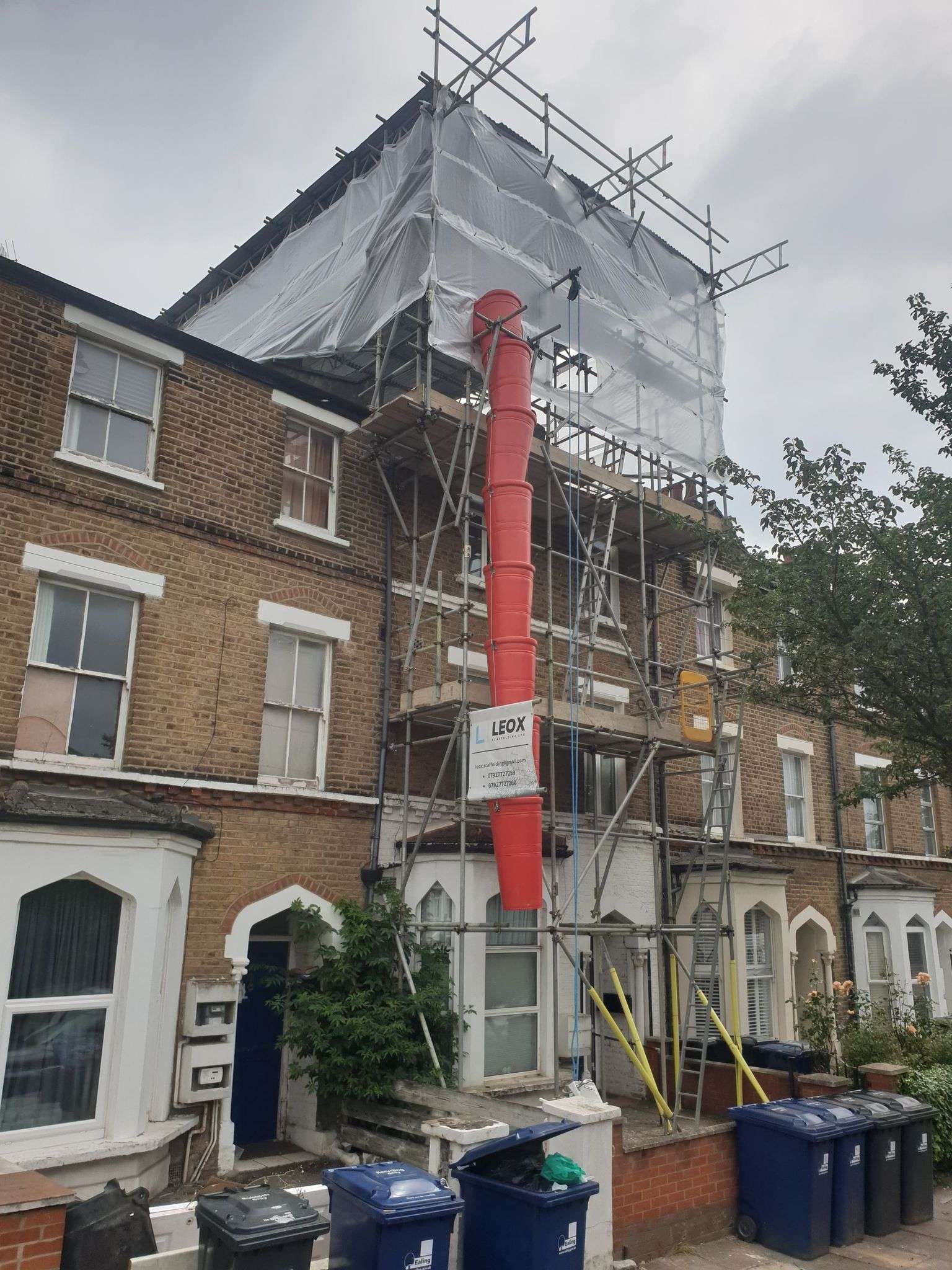 scaffolding hire London red rubbish chutes