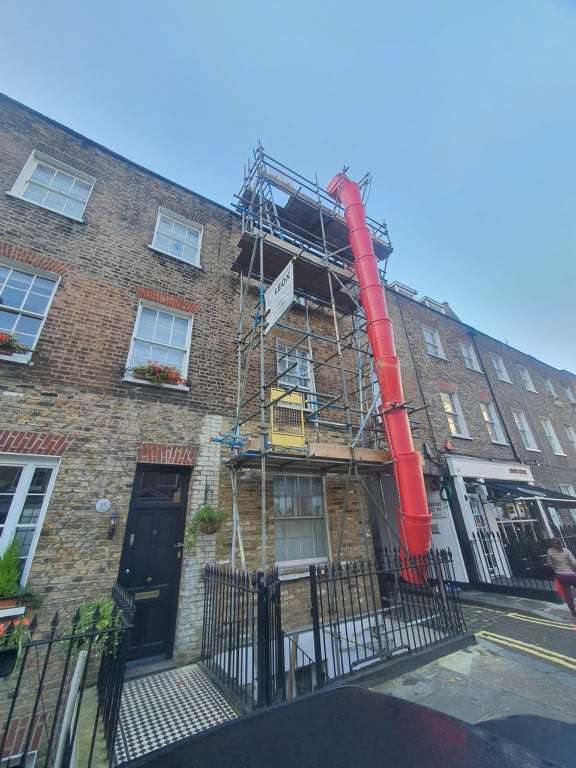 scaffolding London old brick buildings